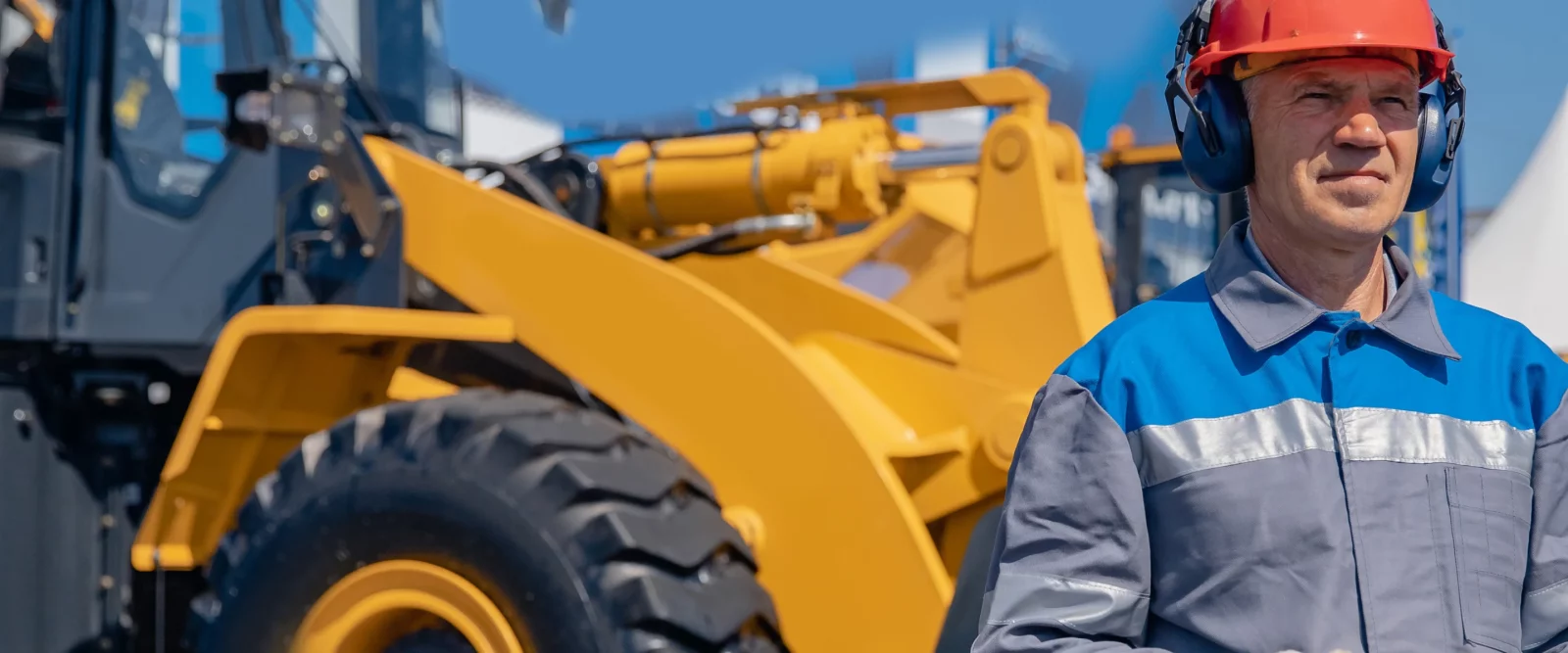 Construction worker with his helmet and headset